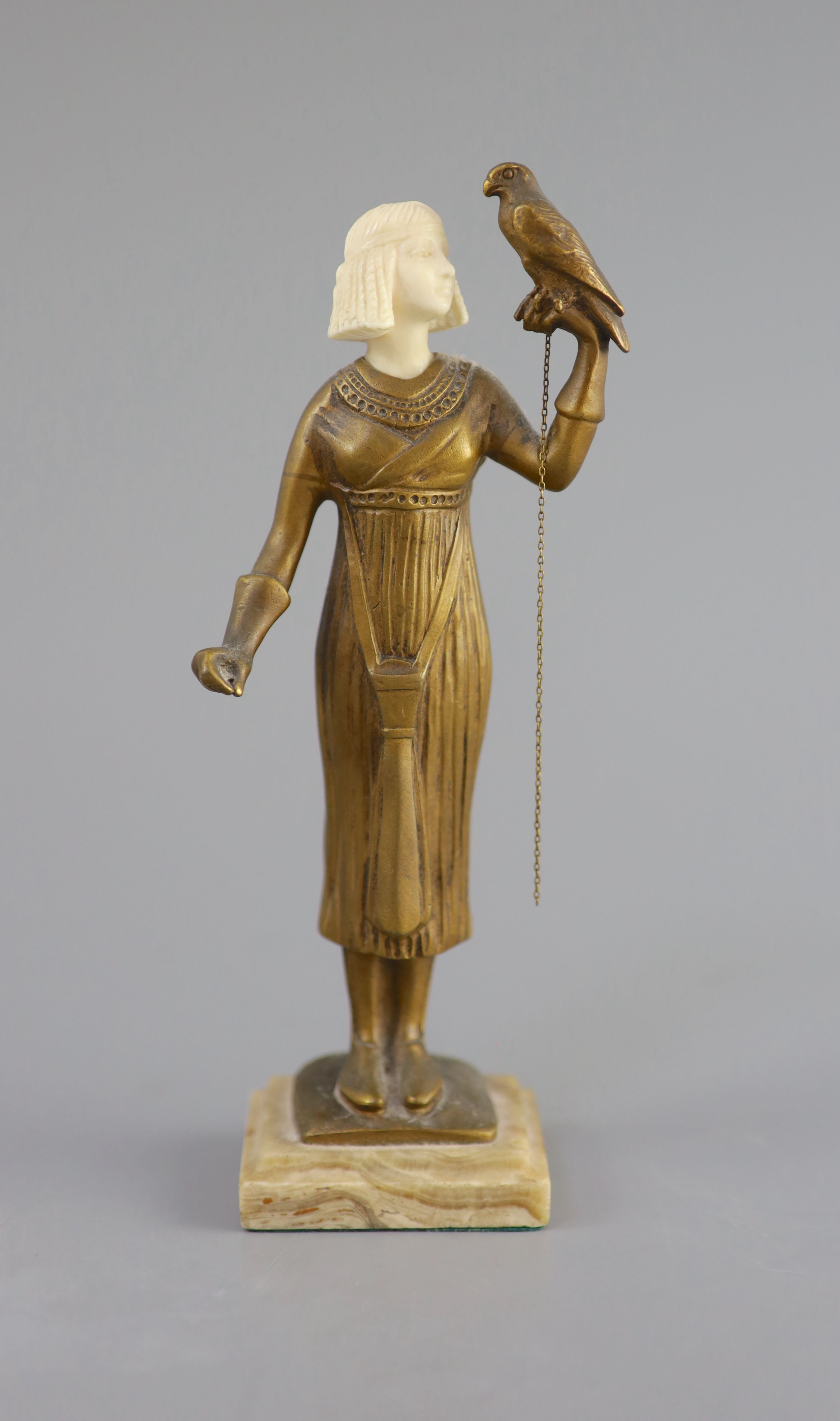 Hélène Maynard White (American, b.1870). A bronze and ivory figure of an Egyptianesque girl, holding a falcon, c1920, 20cm high